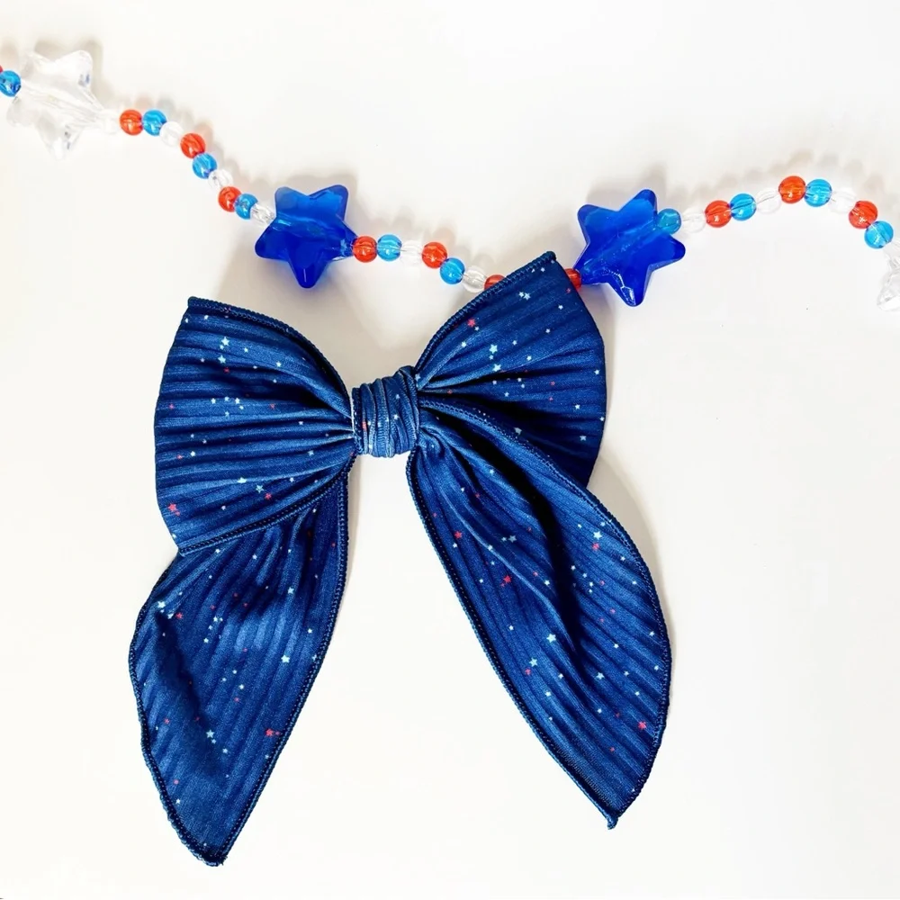 Speckled Fourth of July Cam Bow